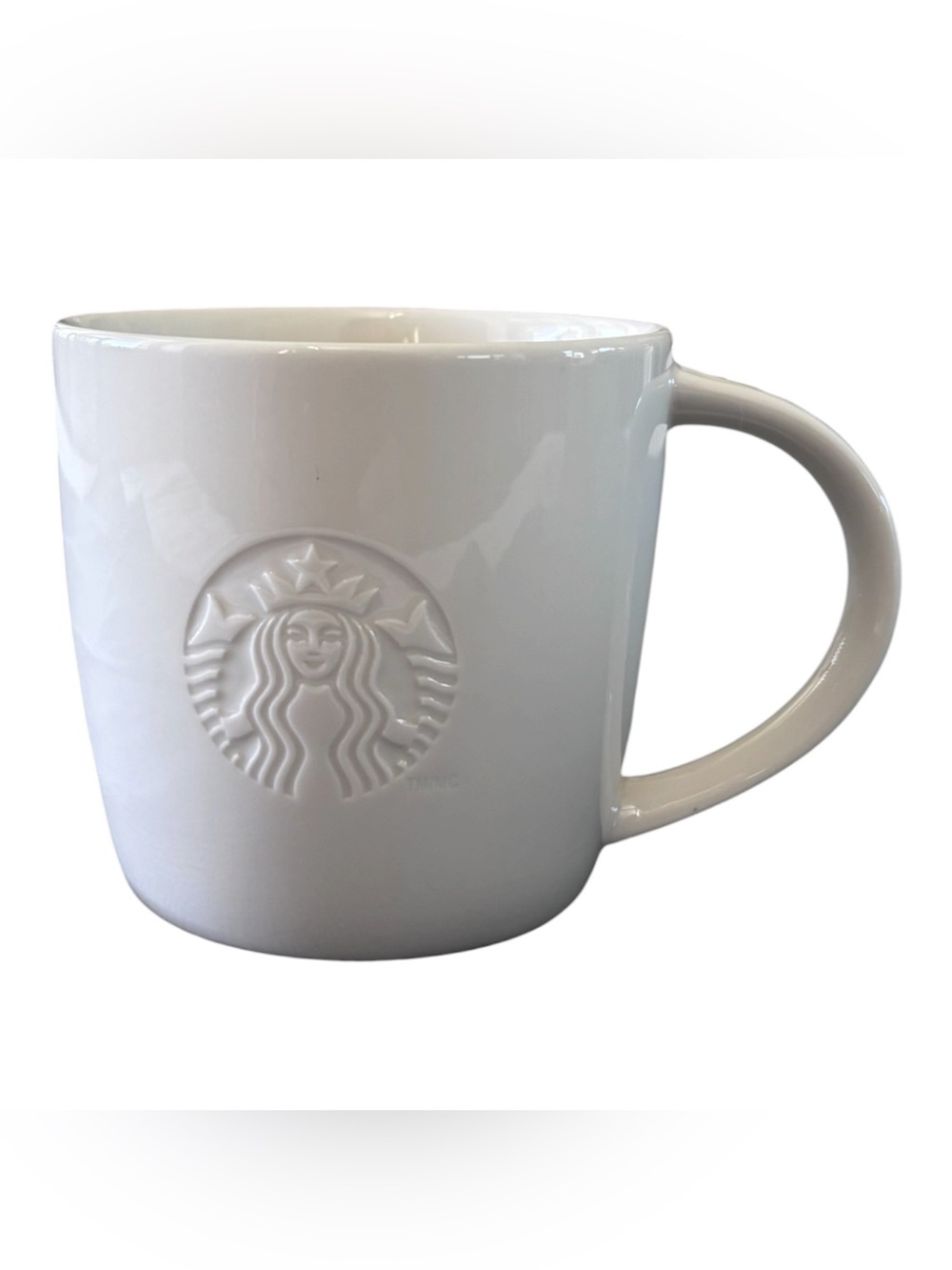 Starbucks 2010 White Embossed Logo Ceramic Mug